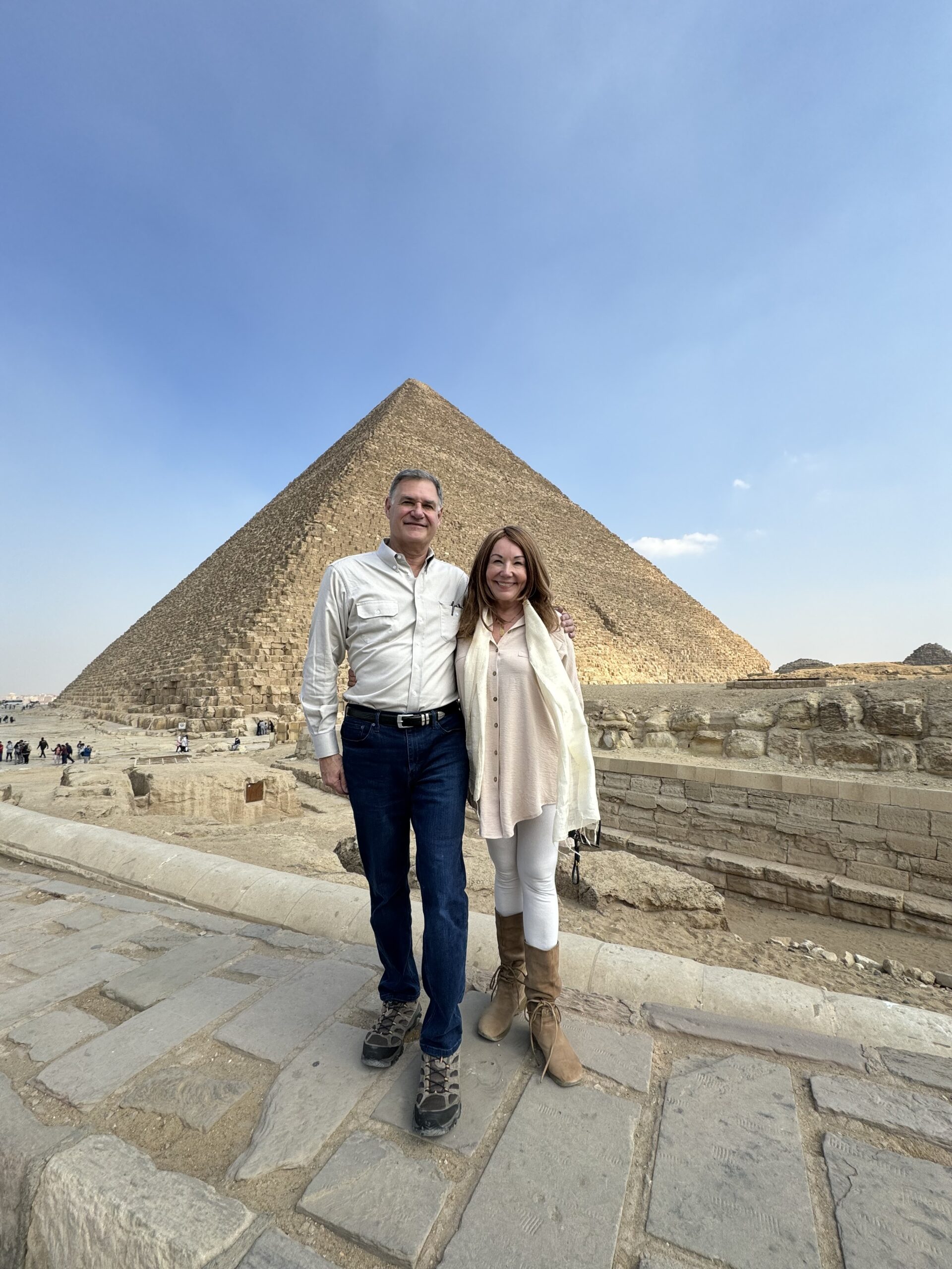Debra Stangl and Richard Kepple in front of the pyramids in Egypt.