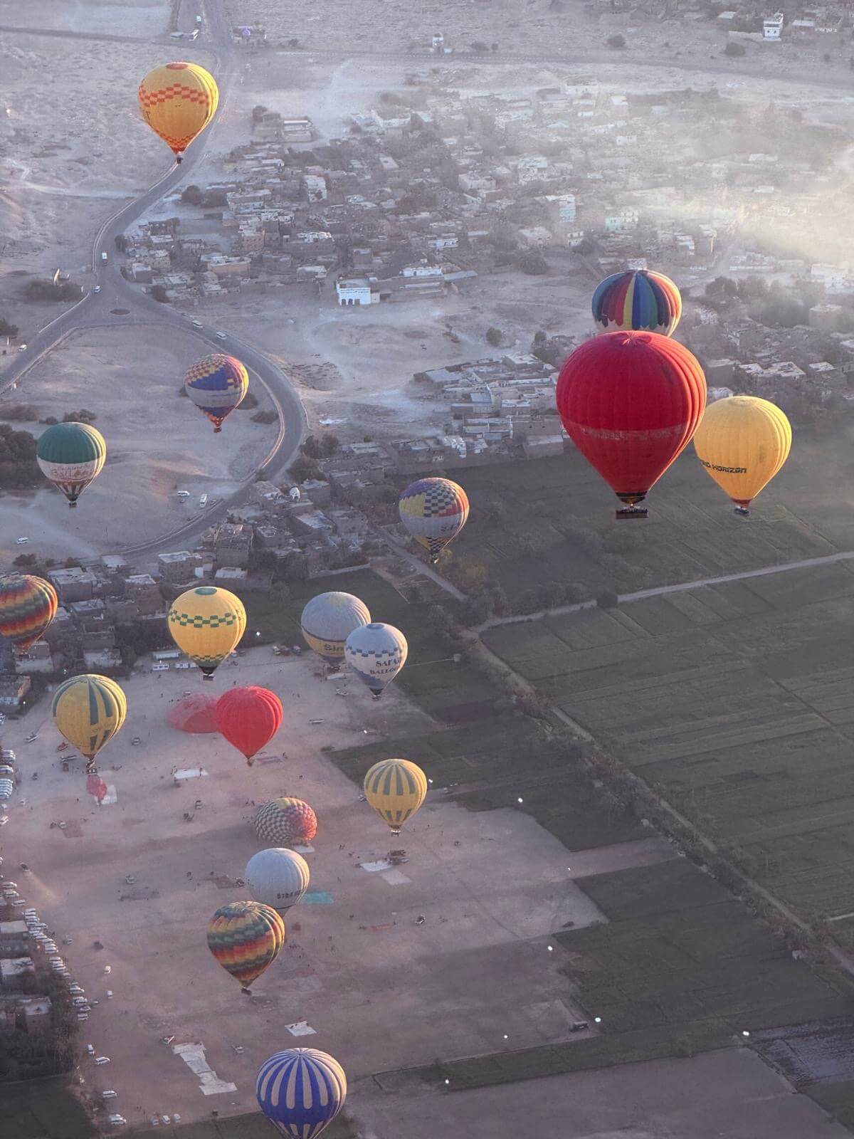 Hot air balloons floating over Egypt